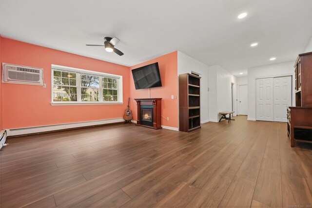 1060 New Haven Ave Apt 7, Milford, CT 06460 - unfurnished living room with a wall mounted air conditioner, ceiling fan, a glass covered fireplace, dark wood-style floors, and recessed lighting
