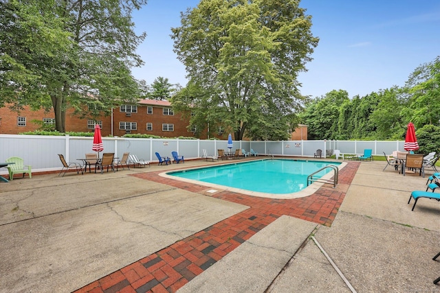 1060 New Haven Ave Apt 7, Milford, CT 06460 - community pool featuring a patio and outdoor dining area