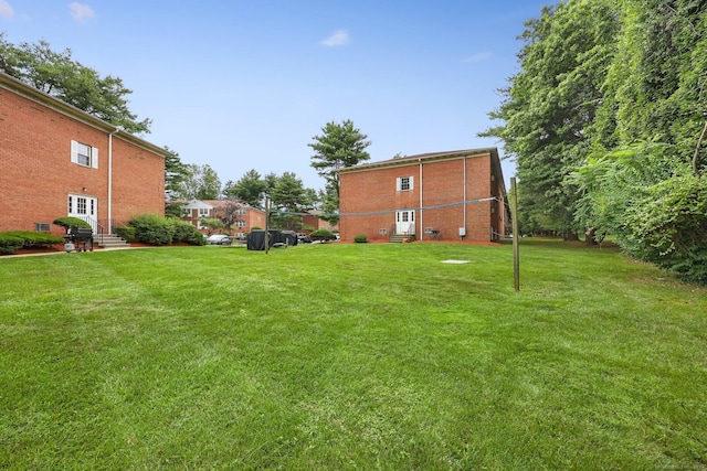 1060 New Haven Ave Apt 7, Milford, CT 06460 - view of grassy yard with entry steps
