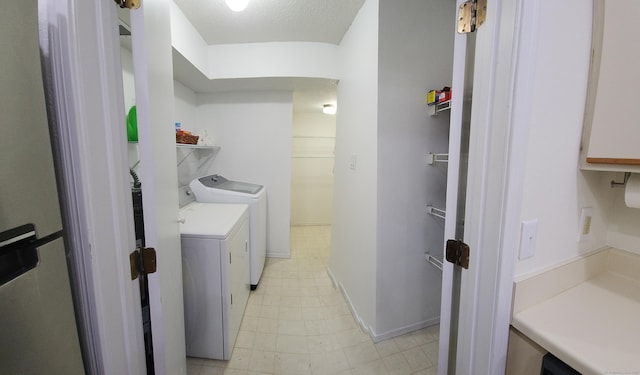 59 Leafwood Ln Apt 275, Groton, CT 06340 - laundry area featuring washing machine and dryer and a textured ceiling