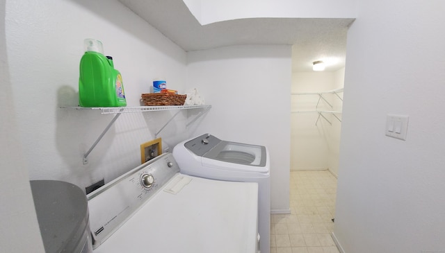 59 Leafwood Ln Apt 275, Groton, CT 06340 - washroom featuring washer and clothes dryer and tile patterned floors