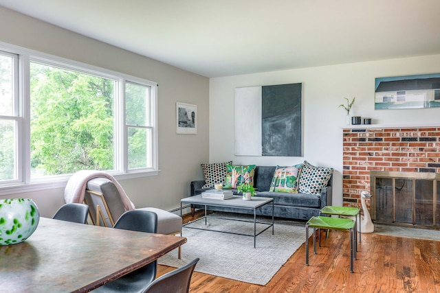 23 Bell Hill Rd, Washington, CT 06793 - living area with wood finished floors, healthy amount of natural light, and baseboard heating
