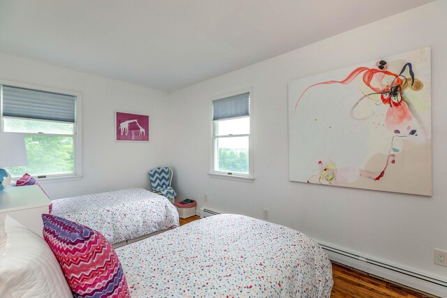 23 Bell Hill Rd, Washington, CT 06793 - bedroom with baseboard heating, multiple windows, and wood finished floors