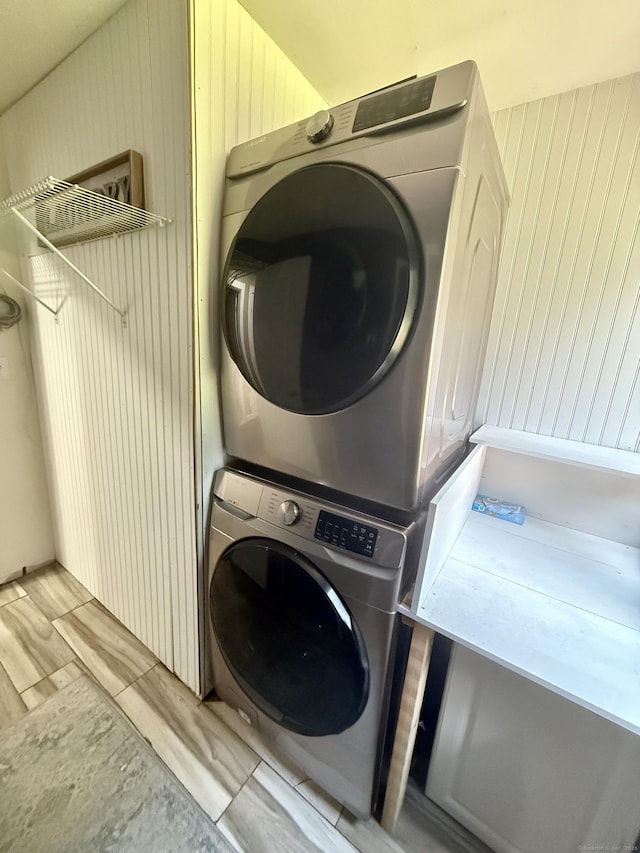 13 Myrna Dr, Marlborough, CT 06447 - washroom featuring stacked washer / dryer and wood walls