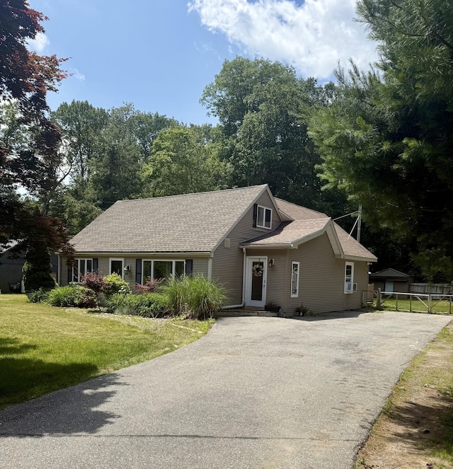 13 Myrna Dr, Marlborough, CT 06447 - view of front of house with driveway and roof with shingles