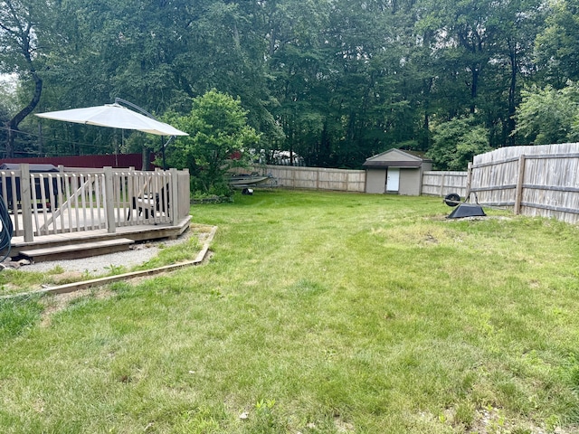 13 Myrna Dr, Marlborough, CT 06447 - fenced backyard featuring a shed and a wooden deck