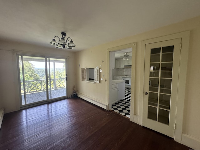 605 Laurel Hill Rd, Norwich, CT 06360 - unfurnished dining area with a baseboard heating unit, a chandelier, and wood finished floors