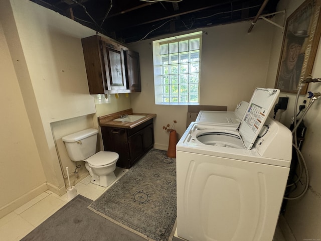 605 Laurel Hill Rd, Norwich, CT 06360 - washroom with independent washer and dryer and light tile patterned floors