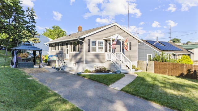 4 Warfield St, Milford, CT 06461 - view of front facade featuring a gazebo and a chimney
