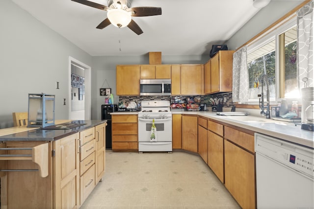 4 Warfield St, Milford, CT 06461 - kitchen with white appliances, tasteful backsplash, ceiling fan, and a kitchen island