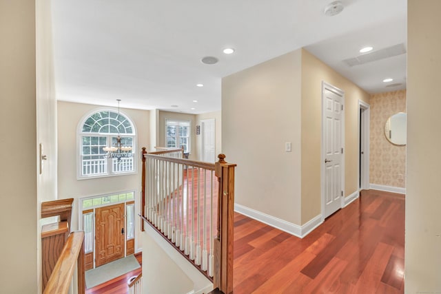 19 Woodlawn Dr, Trumbull, CT 06611 - corridor featuring an upstairs landing, wood finished floors, a chandelier, and recessed lighting