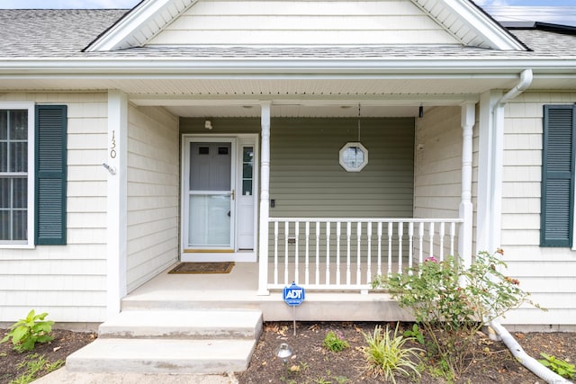 130 Bird Rd, Bristol, CT 06010 - property entrance with a porch and roof with shingles