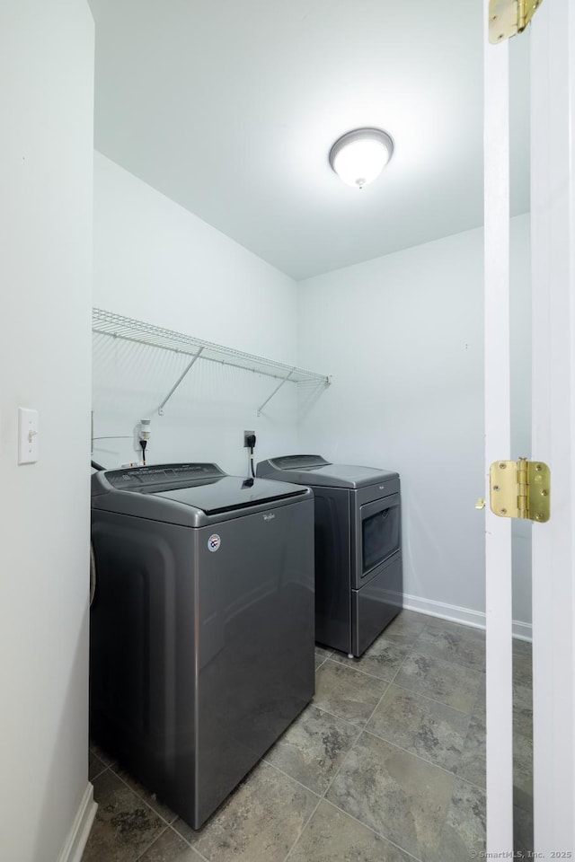 130 Bird Rd, Bristol, CT 06010 - washroom with independent washer and dryer and stone finish floors