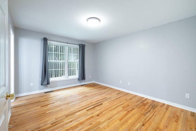 130 Bird Rd, Bristol, CT 06010 - unfurnished room featuring wood finished floors and baseboards