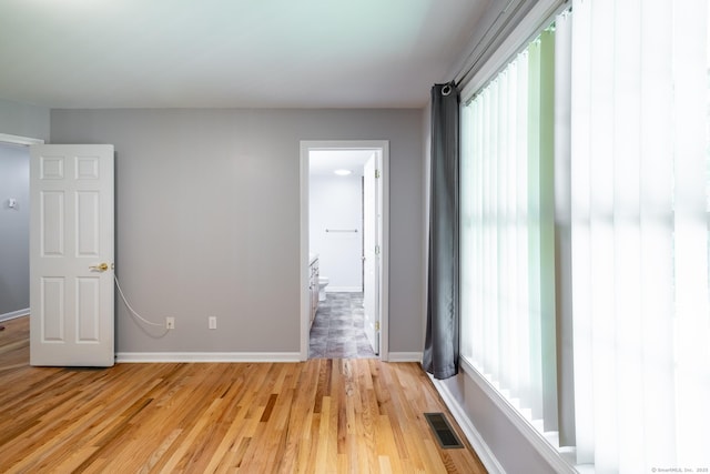 130 Bird Rd, Bristol, CT 06010 - empty room featuring baseboards and light wood finished floors