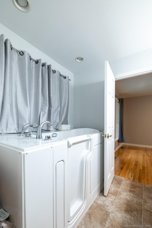 130 Bird Rd, Bristol, CT 06010 - bathroom featuring baseboards