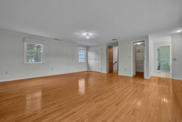 7 Sharon Ln, Old Saybrook, CT 06475 - unfurnished bedroom with crown molding, light wood-style floors, and ensuite bath