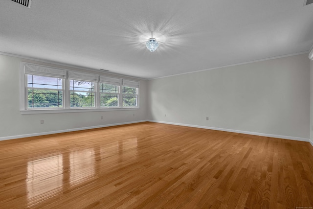 7 Sharon Ln, Old Saybrook, CT 06475 - unfurnished room featuring crown molding and light wood-style flooring