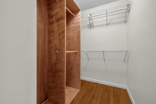 7 Sharon Ln, Old Saybrook, CT 06475 - spacious closet with wood finished floors