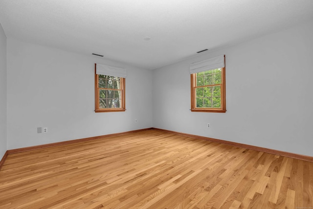 7 Sharon Ln, Old Saybrook, CT 06475 - empty room with light wood-style floors and baseboards