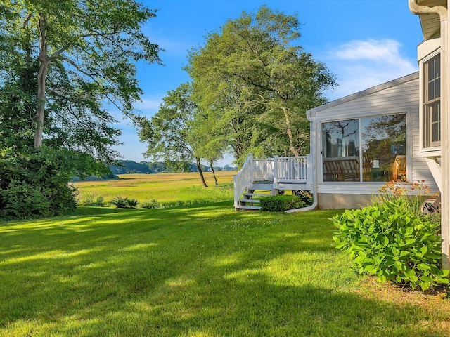 7 Sharon Ln, Old Saybrook, CT 06475 - view of green lawn with a deck