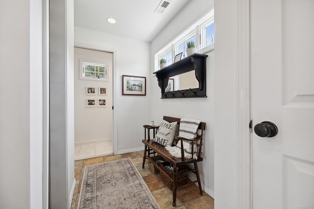 64 Red Top Dr, West Hartford, CT 06110 - doorway to outside with light stone finish flooring and recessed lighting
