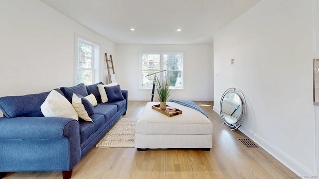 12 Woodland Dr, Milford, CT 06460 - living room with wood finished floors and recessed lighting