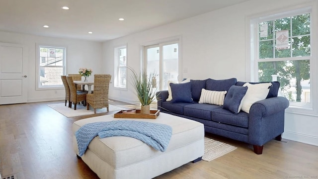 12 Woodland Dr, Milford, CT 06460 - living room with plenty of natural light, wood finished floors, and recessed lighting