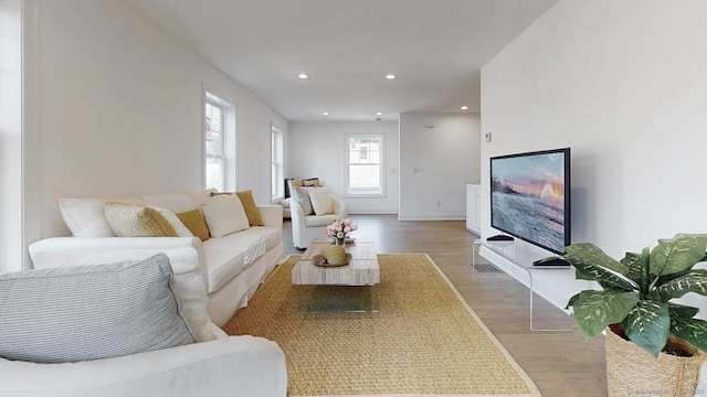 12 Woodland Dr, Milford, CT 06460 - living area featuring light wood-type flooring and recessed lighting