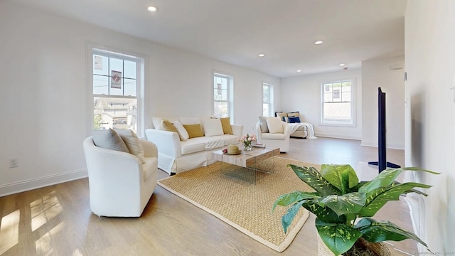 12 Woodland Dr, Milford, CT 06460 - living room with wood finished floors and recessed lighting