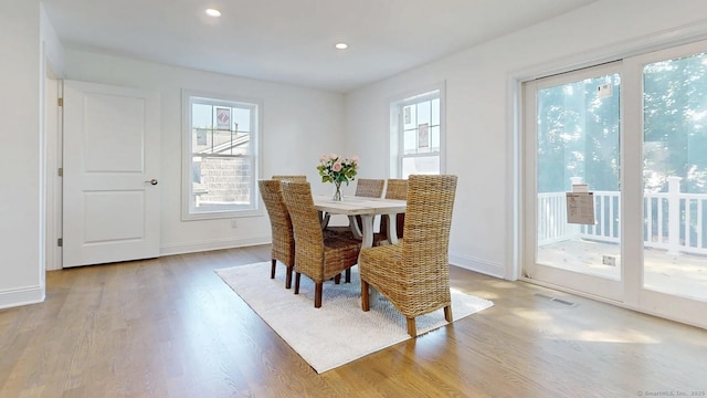 12 Woodland Dr, Milford, CT 06460 - dining room with light wood finished floors and recessed lighting