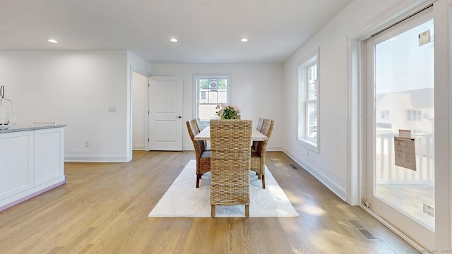 12 Woodland Dr, Milford, CT 06460 - dining area featuring light wood-style floors and recessed lighting