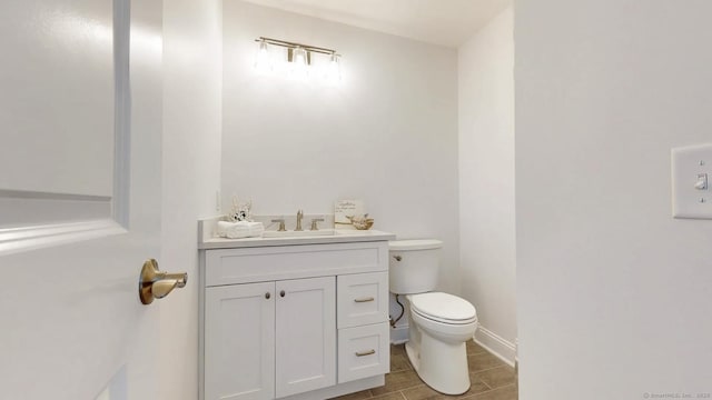 12 Woodland Dr, Milford, CT 06460 - half bathroom with toilet and vanity
