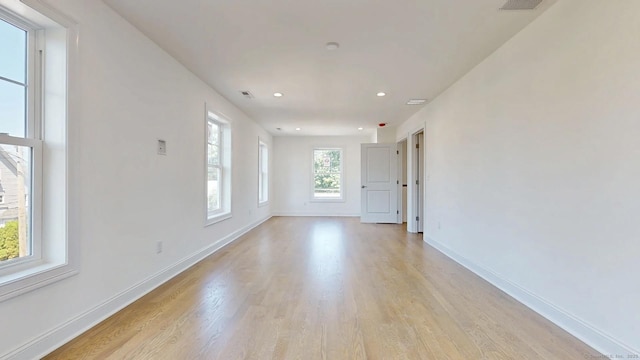 12 Woodland Dr, Milford, CT 06460 - empty room featuring light wood finished floors and recessed lighting