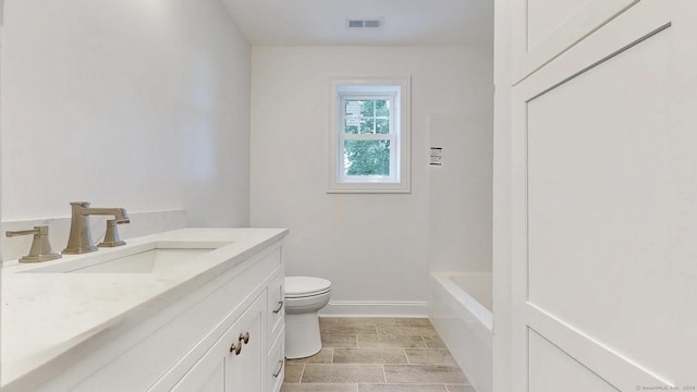 12 Woodland Dr, Milford, CT 06460 - full bath with vanity, a tub to relax in, and wood finish floors