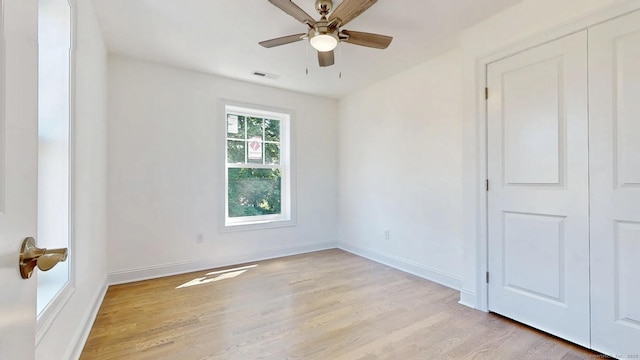 12 Woodland Dr, Milford, CT 06460 - empty room featuring light wood-style floors and a ceiling fan