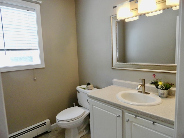 17 Ridge View Ter, New Hartford, CT 06057 - half bathroom with a baseboard heating unit, vanity, plenty of natural light, and tile patterned floors