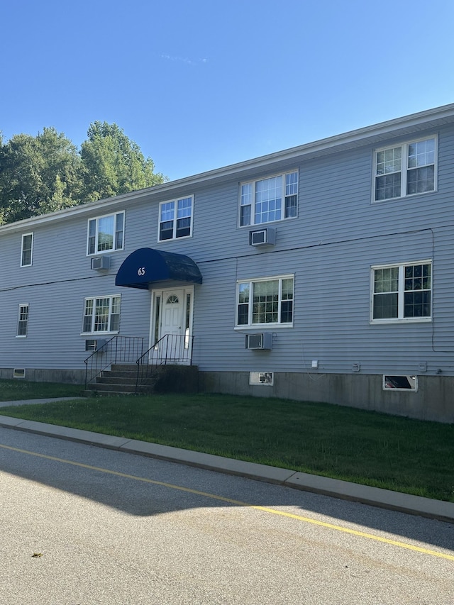 65 Horse Pond Rd Apt G, Salem, CT 06420 - view of front of home featuring a front lawn and cooling unit