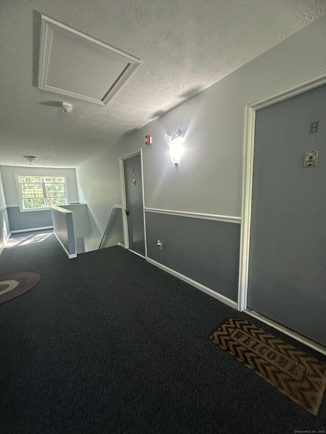 65 Horse Pond Rd Apt G, Salem, CT 06420 - unfurnished room featuring carpet flooring, a textured ceiling, and a smoke detector
