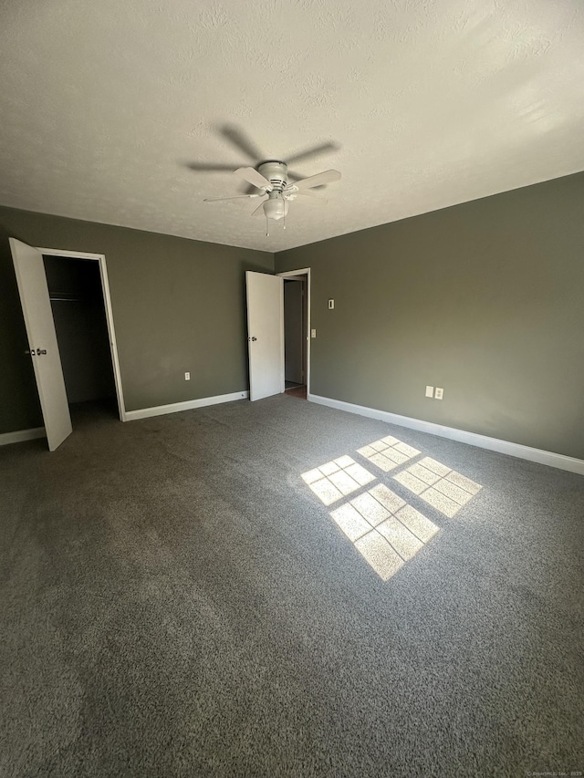 65 Horse Pond Rd Apt G, Salem, CT 06420 - unfurnished bedroom featuring carpet flooring, a textured ceiling, and ceiling fan