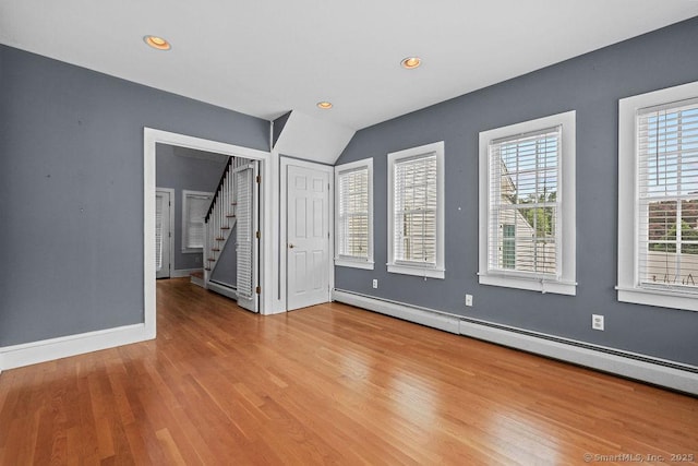 88 Powder Hill Rd, Middlefield, CT 06455 - unfurnished room featuring a baseboard heating unit, wood finished floors, plenty of natural light, stairway, and recessed lighting