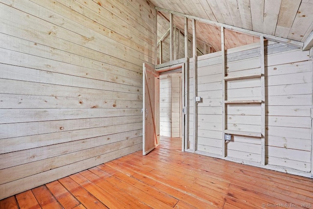 88 Powder Hill Rd, Middlefield, CT 06455 - empty room with wooden walls, wood-type flooring, lofted ceiling, and wooden ceiling