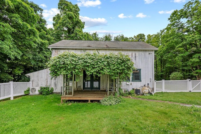 88 Powder Hill Rd, Middlefield, CT 06455 - rear view of house with a fenced backyard and french doors
