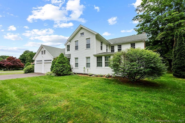 88 Powder Hill Rd, Middlefield, CT 06455 - view of front of home with asphalt driveway, a front yard, and an attached garage