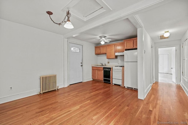 88 Powder Hill Rd, Middlefield, CT 06455 - kitchen featuring radiator, white appliances, under cabinet range hood, light wood-style floors, and light countertops