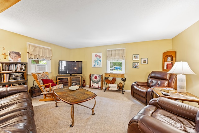 carpeted living room featuring cooling unit and baseboards