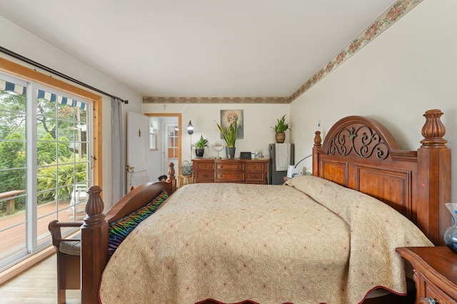 53 Columbus Ave, Bristol, CT 06010 - bedroom featuring access to exterior and wood finished floors