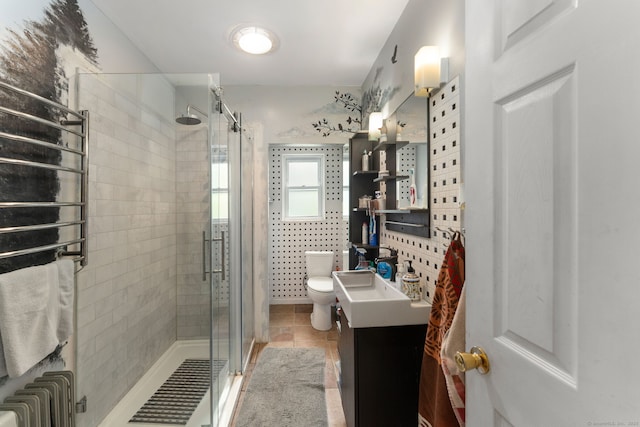 53 Columbus Ave, Bristol, CT 06010 - bathroom featuring radiator, vanity, tile patterned floors, and a shower stall