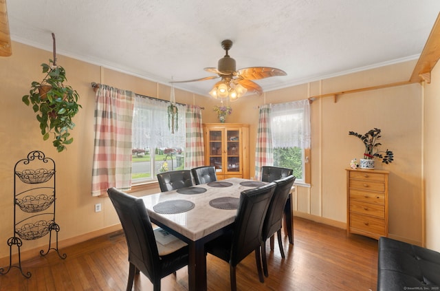 53 Columbus Ave, Bristol, CT 06010 - dining area featuring wood-type flooring, ceiling fan, and ornamental molding