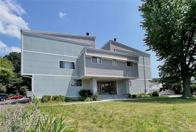296 Main Ave Unit 1, Norwalk, CT 06851 - rear view of property featuring a porch and a yard
